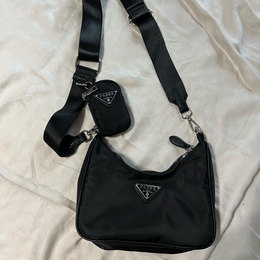 Black cross body bag with a mini pouch